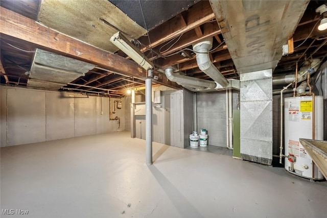 unfinished basement with heating unit and gas water heater