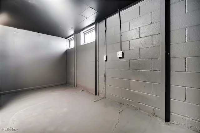 below grade area with concrete block wall