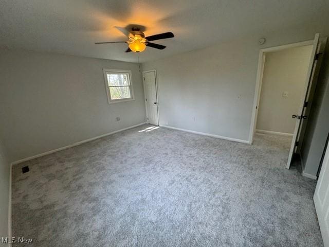 6720 Prior Rd, Nashport, OH 43830 - unfurnished bedroom featuring baseboards, ceiling fan, and carpet flooring