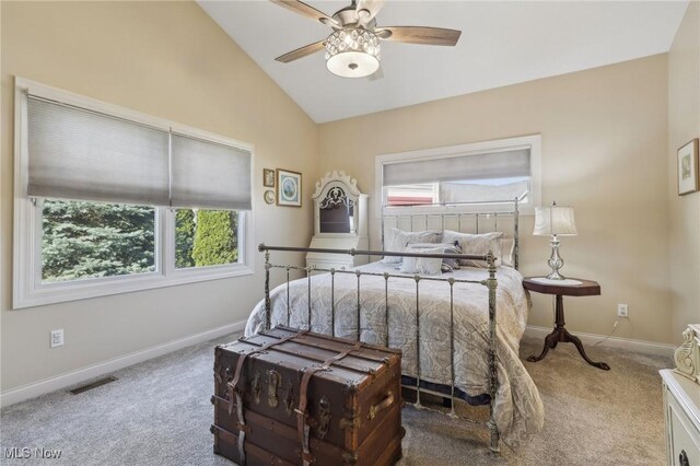 bedroom featuring carpet floors, a ceiling fan, baseboards, lofted ceiling, and visible vents