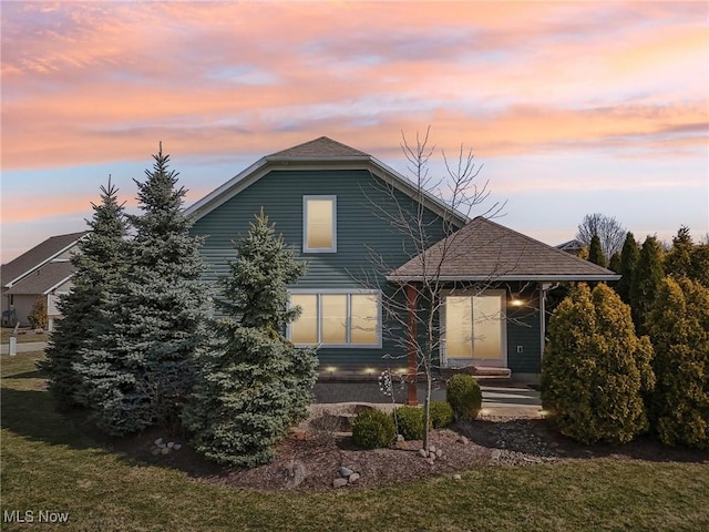 exterior space featuring a front yard