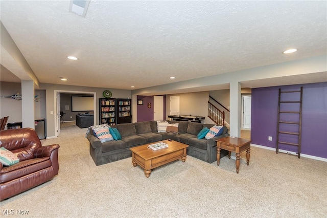carpeted living room with recessed lighting, a textured ceiling, baseboards, and stairway