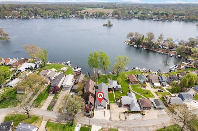 aerial view with a water view and a residential view