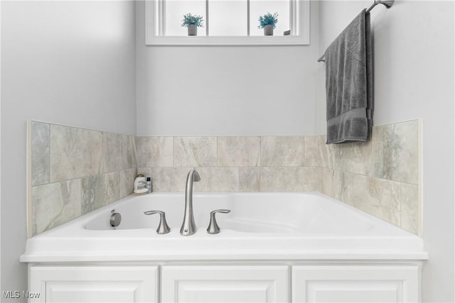 full bathroom featuring a bath