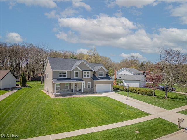 traditional home with a porch, driveway, and a front lawn