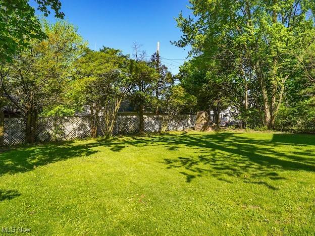 view of yard featuring fence