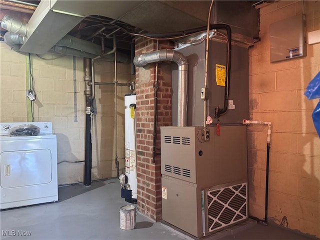 utility room featuring heating unit, washer / dryer, and water heater