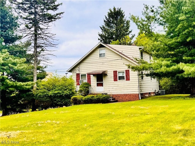 25911 Tryon Rd, Oakwood Village, OH 44146 - view of front facade with a front yard