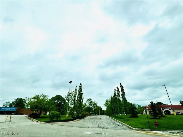 25911 Tryon Rd, Oakwood Village, OH 44146 - view of asphalt street with curbs