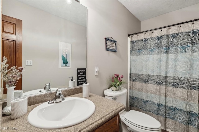 full bathroom with toilet, a shower with curtain, and vanity