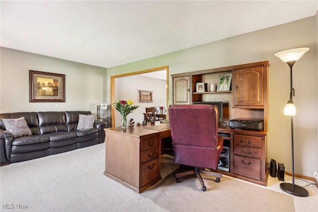 office featuring light carpet