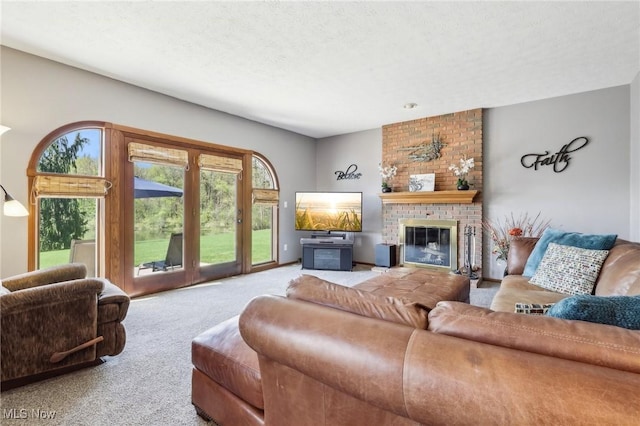 carpeted living room with a fireplace