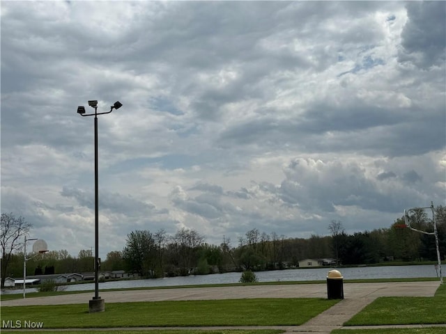 view of home's community with a water view