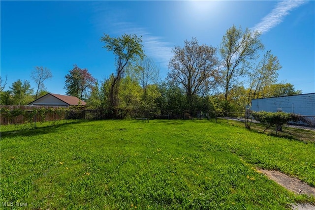 view of yard featuring fence