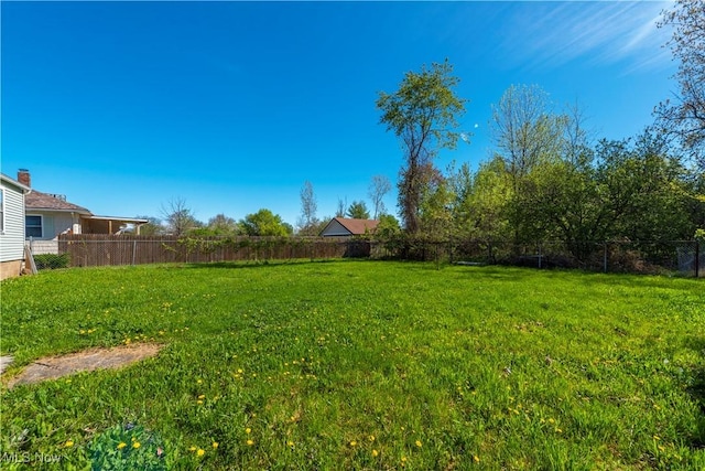 view of yard featuring fence