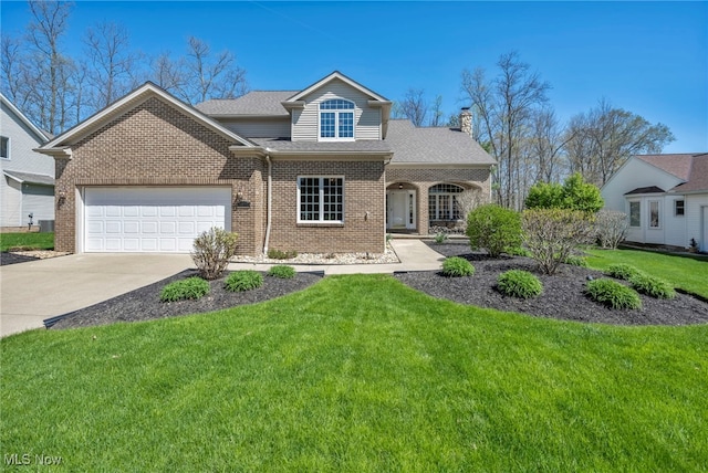 traditional-style home with a garage, a front yard, a chimney, brick siding, and concrete driveway