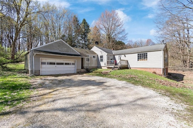 ranch-style home featuring a garage