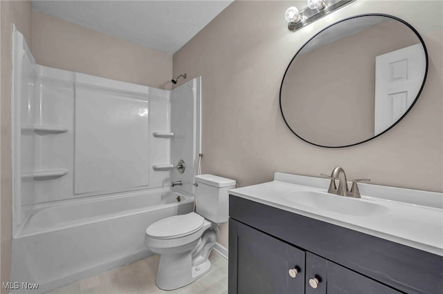 full bath with toilet, shower / bath combination, and vanity