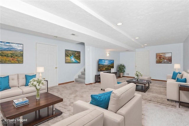 carpeted living room with stairway, baseboards, recessed lighting, and visible vents