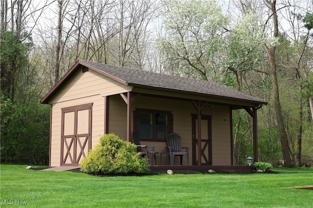 view of outbuilding featuring a porch