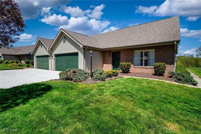 single story home with roof with shingles, a front yard, a garage, brick siding, and concrete driveway