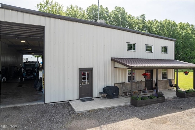 modern inspired farmhouse featuring metal roof