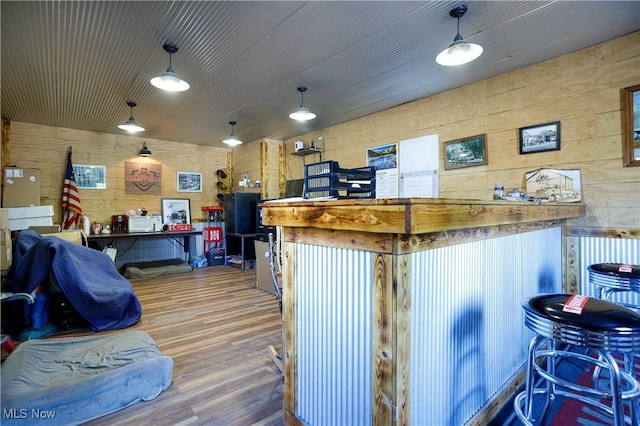 miscellaneous room with wood finished floors