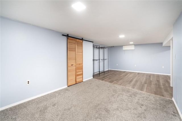 4160 Cambridge Ave, Lorain, OH 44053 - finished below grade area with baseboards, recessed lighting, carpet, and a barn door