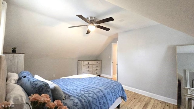 22322 Westwood Rd, Fairview Park, OH 44126 - bedroom with baseboards, ceiling fan, hardwood / wood-style floors, and lofted ceiling