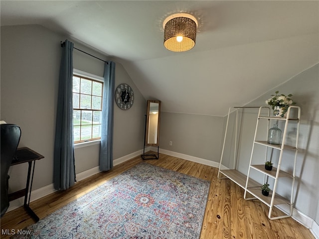 22322 Westwood Rd, Fairview Park, OH 44126 - bonus room featuring baseboards, vaulted ceiling, and wood finished floors