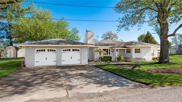 5130 Bateson Dr NE, Thornville, OH 43076 - ranch-style home with an attached garage, concrete driveway, stucco siding, a front lawn, and a chimney