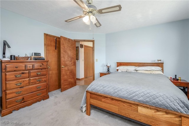 4561 Industry Rd, Ravenna, OH 44266 - bedroom featuring ceiling fan and light colored carpet