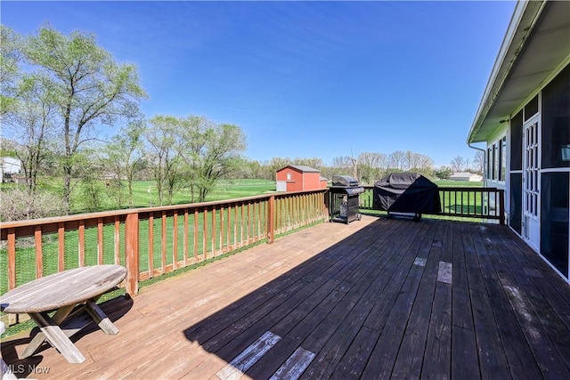 4561 Industry Rd, Ravenna, OH 44266 - deck featuring a yard and grilling area