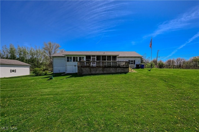 4561 Industry Rd, Ravenna, OH 44266 - rear view of property with a lawn, a wooden deck, and a sunroom