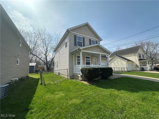 view of front of house with covered porch, fence, central AC unit, and a front lawn