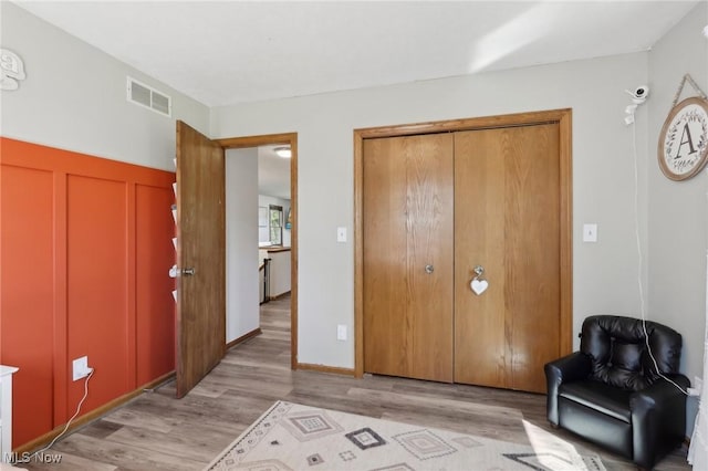 interior space with visible vents and light wood-style flooring