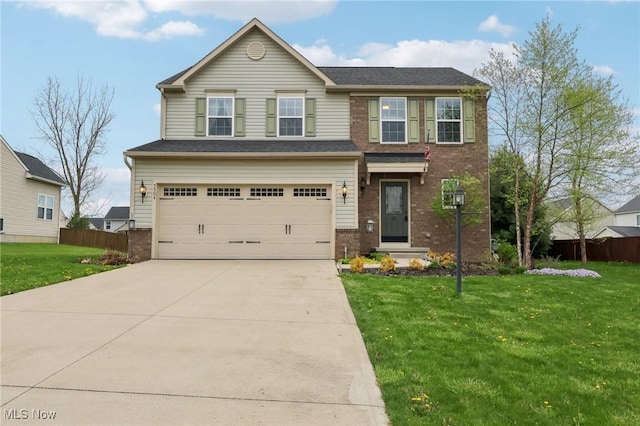 5504 Wightman Cir, Medina, OH 44256 - view of front of home featuring a garage, brick siding, and concrete driveway