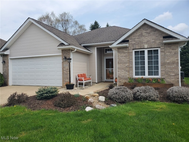 ranch-style house featuring driveway, roof with shingles, a garage, brick siding, and a front lawn
