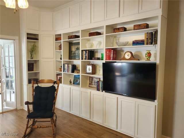 sitting room with wood finished floors