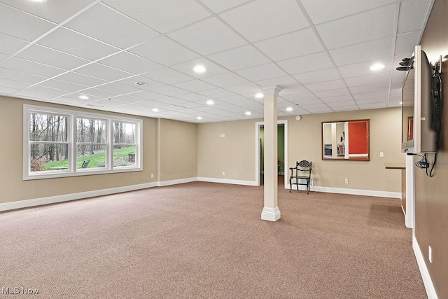 basement featuring carpet floors, baseboards, recessed lighting, and a paneled ceiling