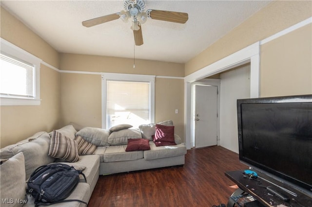 1459 W 107th St, Cleveland, OH 44102 - living room featuring ceiling fan and wood finished floors