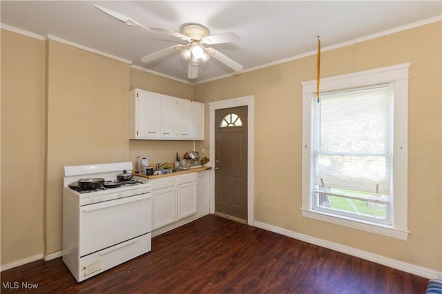 1459 W 107th St, Cleveland, OH 44102 - kitchen with dark wood-type flooring, a ceiling fan, white cabinets, and white gas stove
