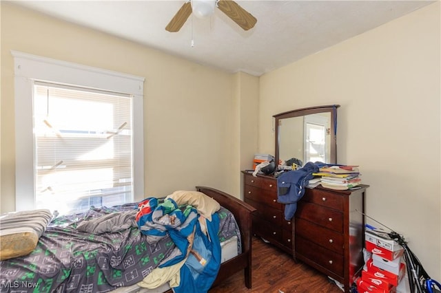 1459 W 107th St, Cleveland, OH 44102 - bedroom featuring ceiling fan and dark wood-type flooring