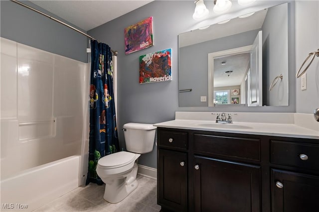 bathroom with vanity, toilet, tile patterned floors, shower / bathtub combination with curtain, and baseboards
