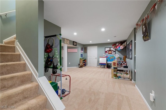 recreation room featuring carpet flooring, recessed lighting, and baseboards