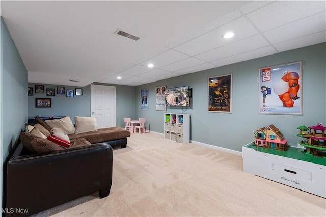 carpeted living room featuring visible vents, recessed lighting, a paneled ceiling, and baseboards