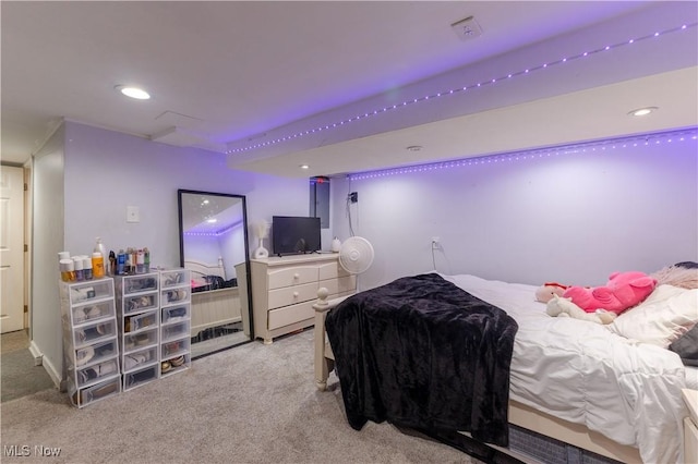 carpeted bedroom featuring recessed lighting