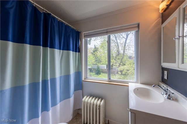 2155 Middlefield Rd, Cleveland Heights, OH 44106 - bathroom featuring crown molding, radiator, vanity, and a shower with curtain