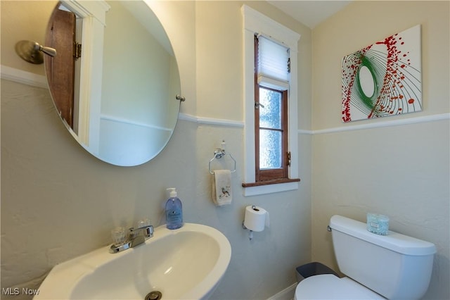 2155 Middlefield Rd, Cleveland Heights, OH 44106 - half bathroom with baseboards, a sink, and toilet