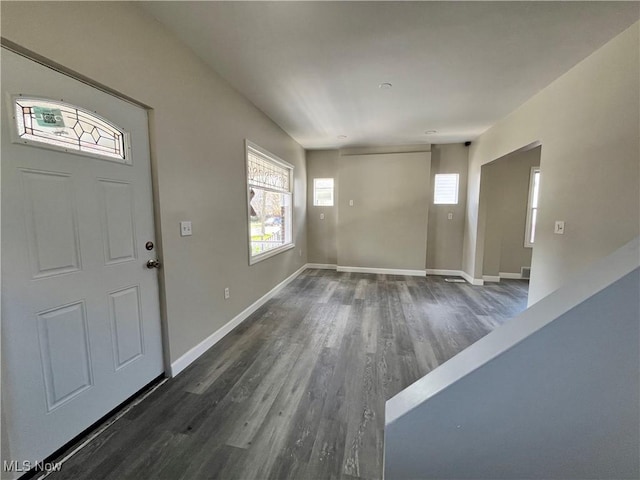 10402 Almira Ave, Cleveland, OH 44111 - foyer featuring baseboards and dark wood finished floors